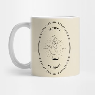 in thing we trust - the addams family Mug